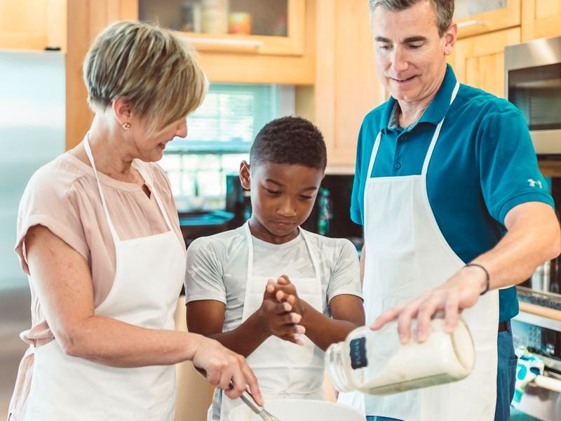 Family baking together in a warm kitchen